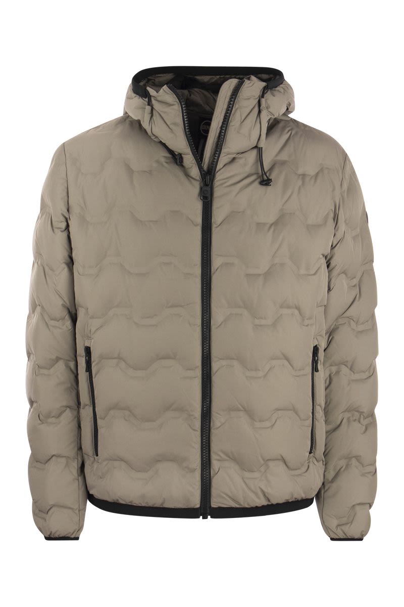 UNCOMMON - Quilted down jacket with hood - VOGUERINI