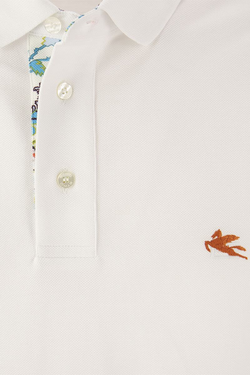 Piqué polo shirt with embroidered Pegasus - VOGUERINI