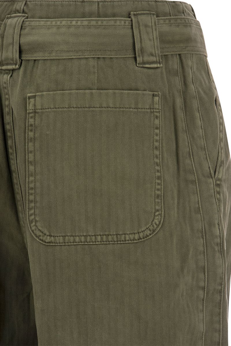 Tapered trousers with belt - VOGUERINI