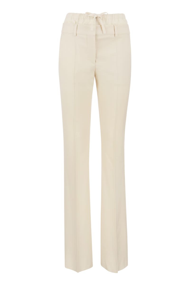 NILLY - Flare pants with double waistband - VOGUERINI