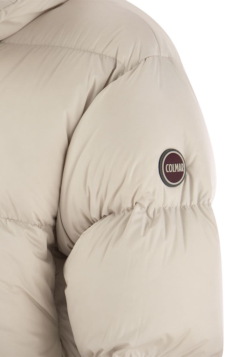 CAPITON - Cropped down jacket with roll neck - VOGUERINI
