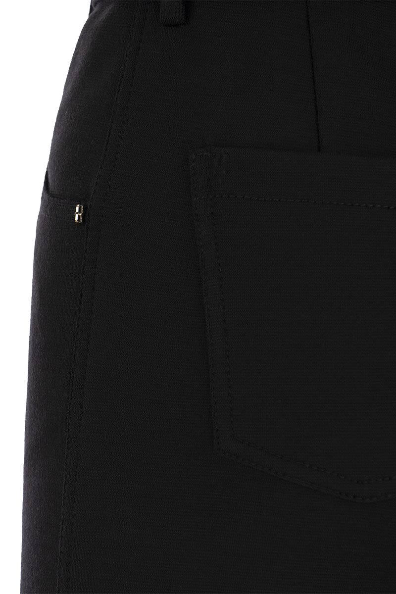 TETI - Stretch wool jersey trousers - VOGUERINI