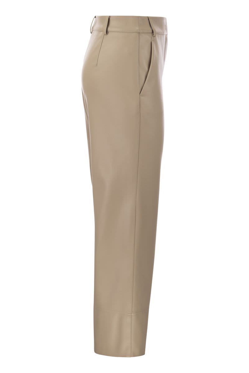 SOPRANO - Slim trousers in coated fabric - VOGUERINI