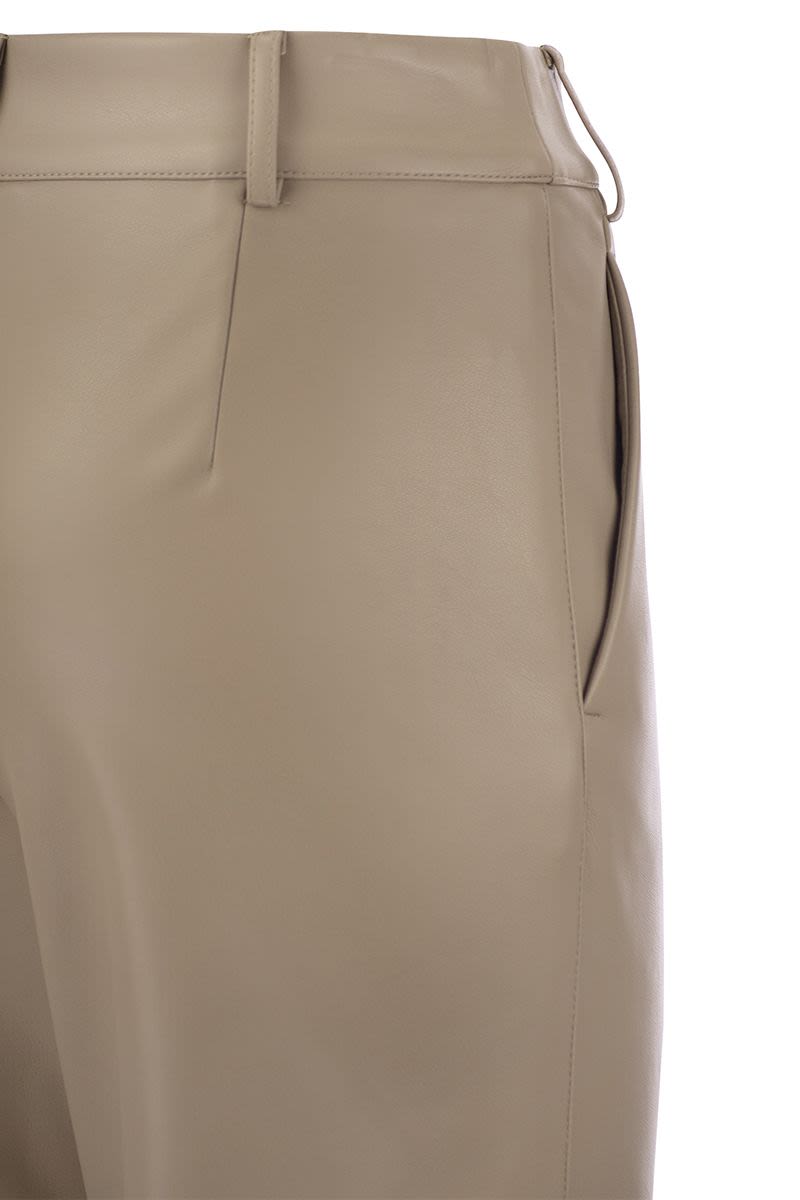 SOPRANO - Slim trousers in coated fabric - VOGUERINI