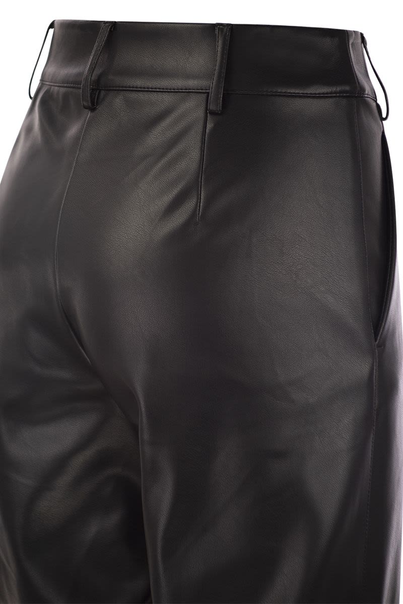 SOPRANO - Slim trousers in coated fabric - VOGUERINI