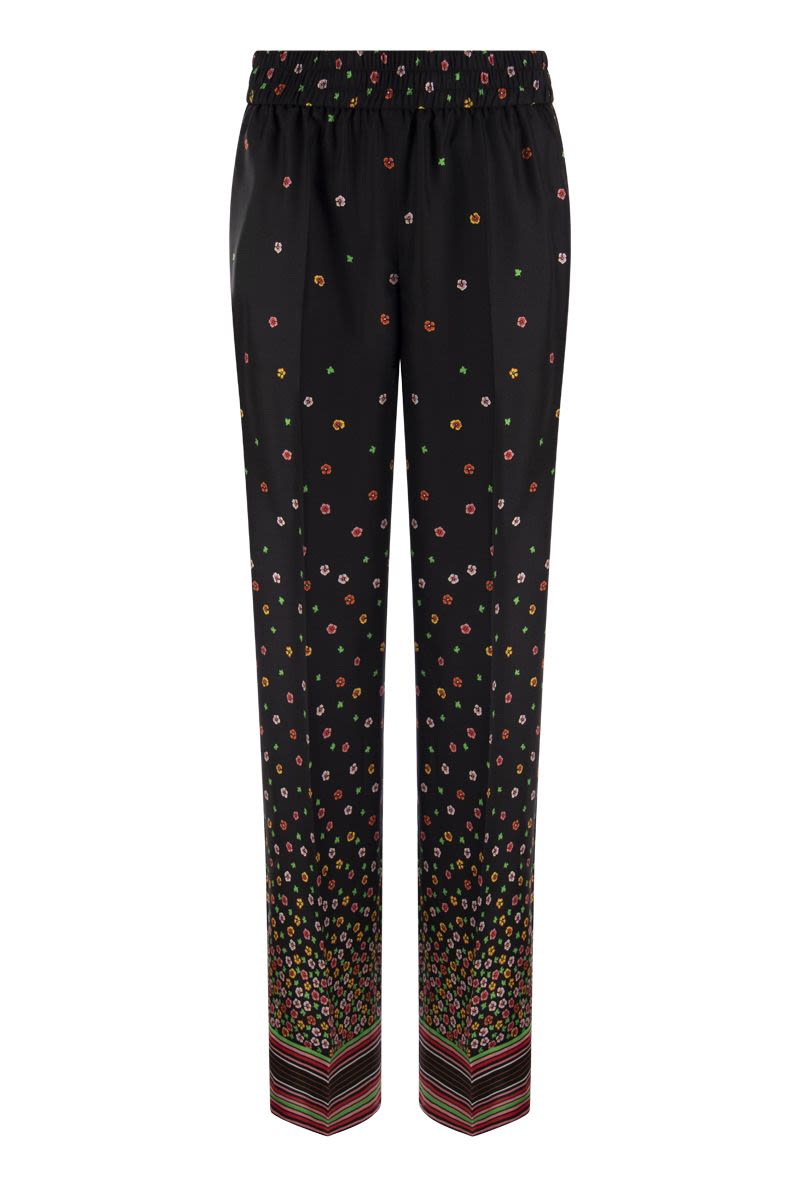 Floral print silk trousers - VOGUERINI