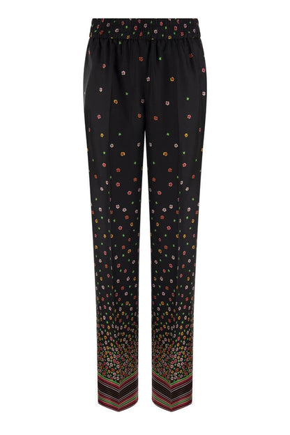 Floral print silk trousers - VOGUERINI