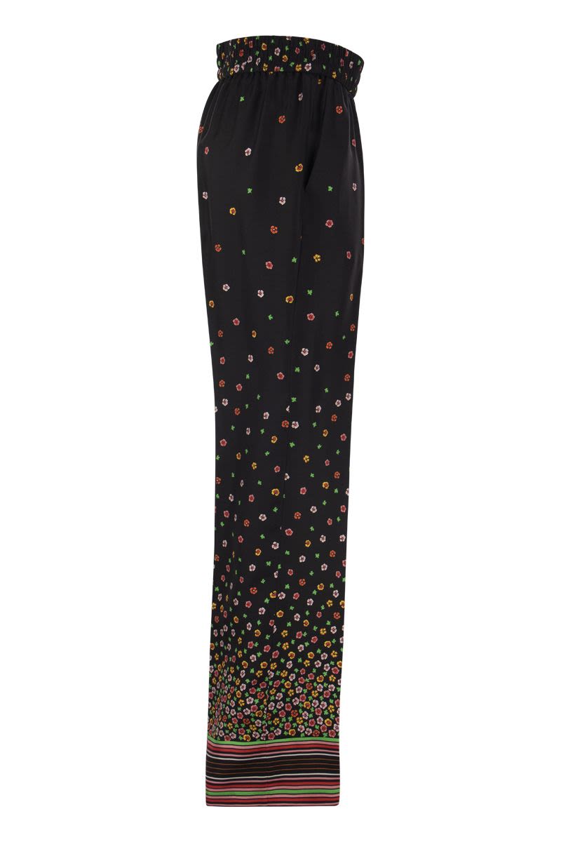 Floral print silk trousers - VOGUERINI