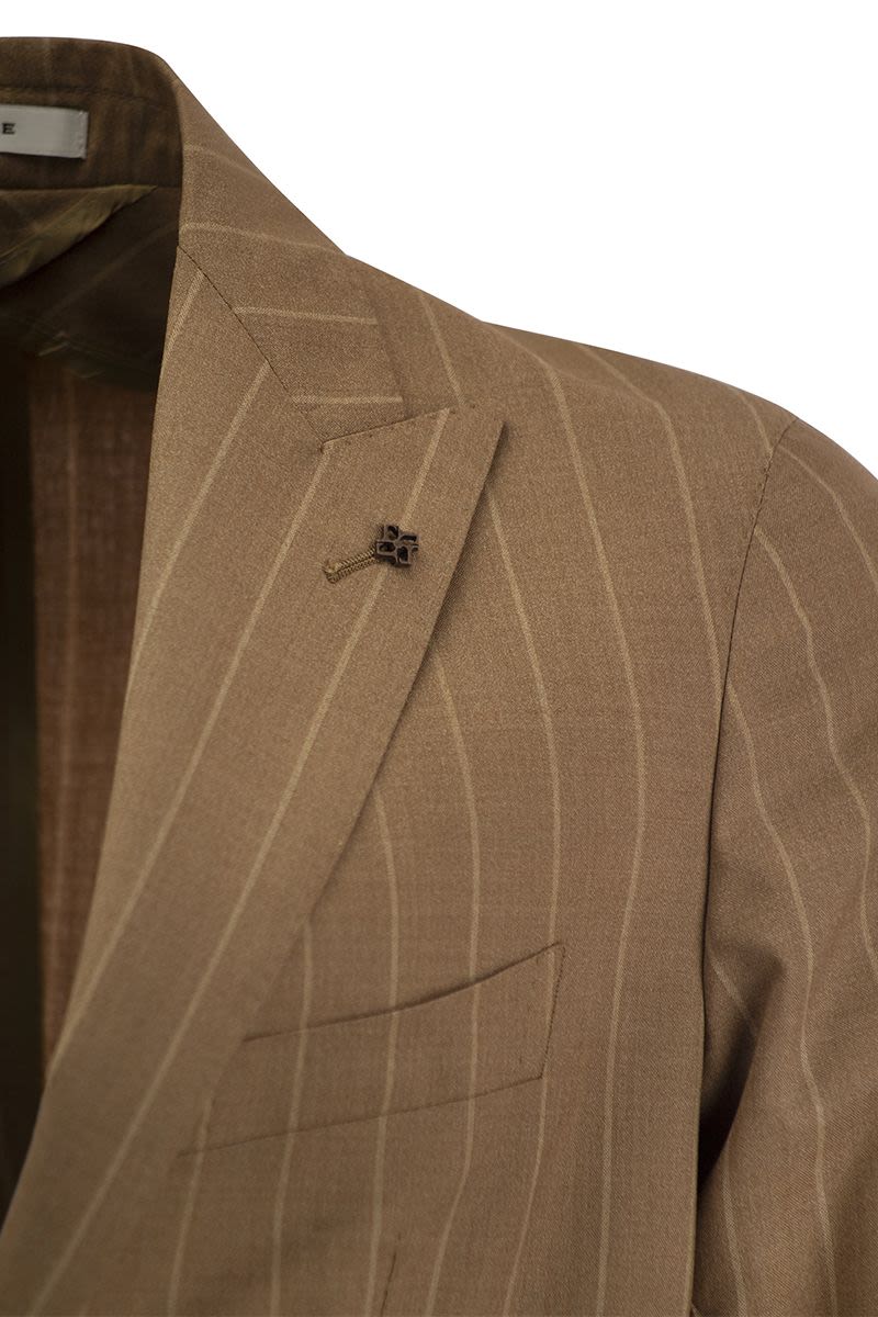 Pinstripe suit in wool and silk