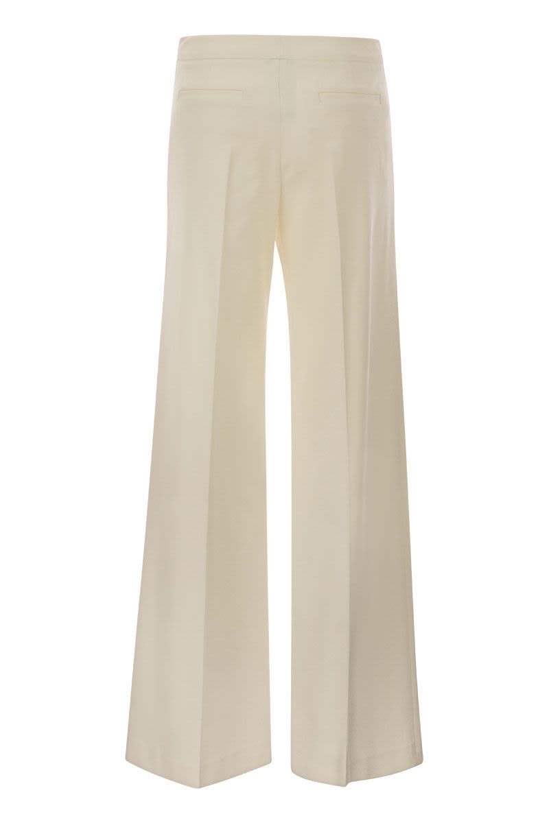 Wide-leg trousers with marinière buttons - VOGUERINI