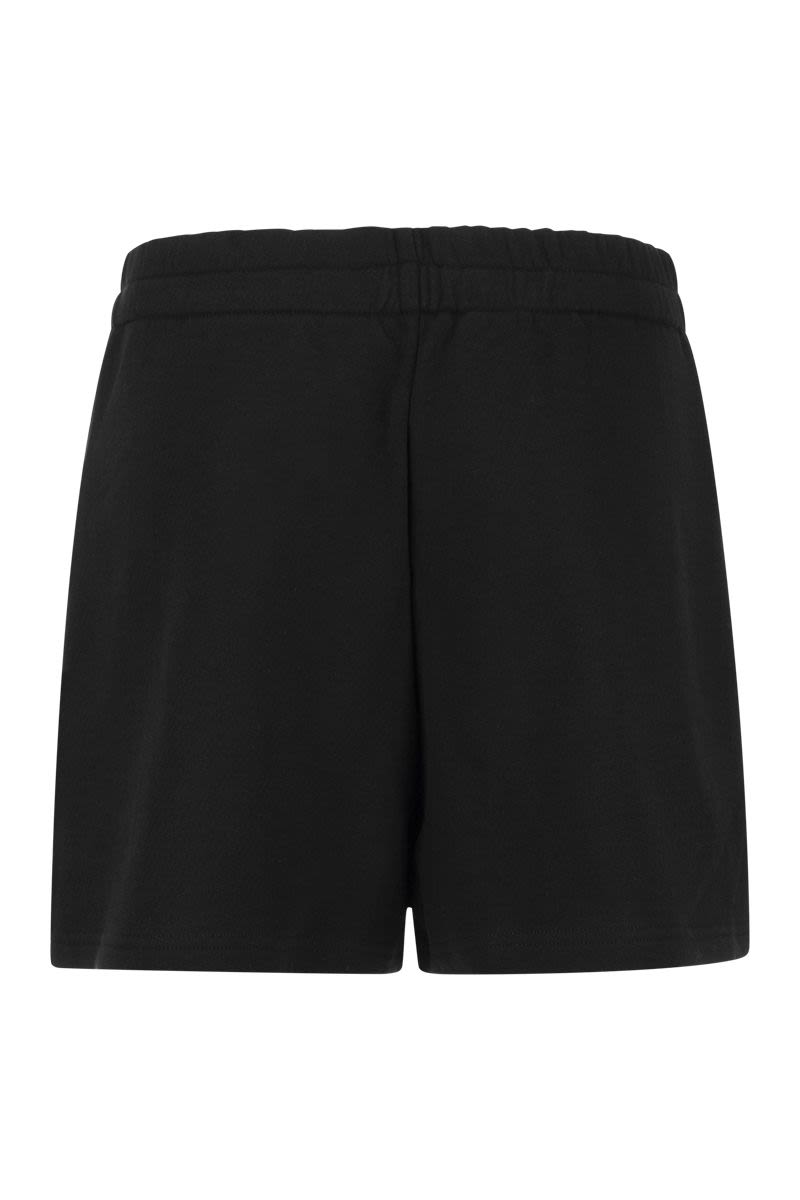 Shorts with palm motif - VOGUERINI