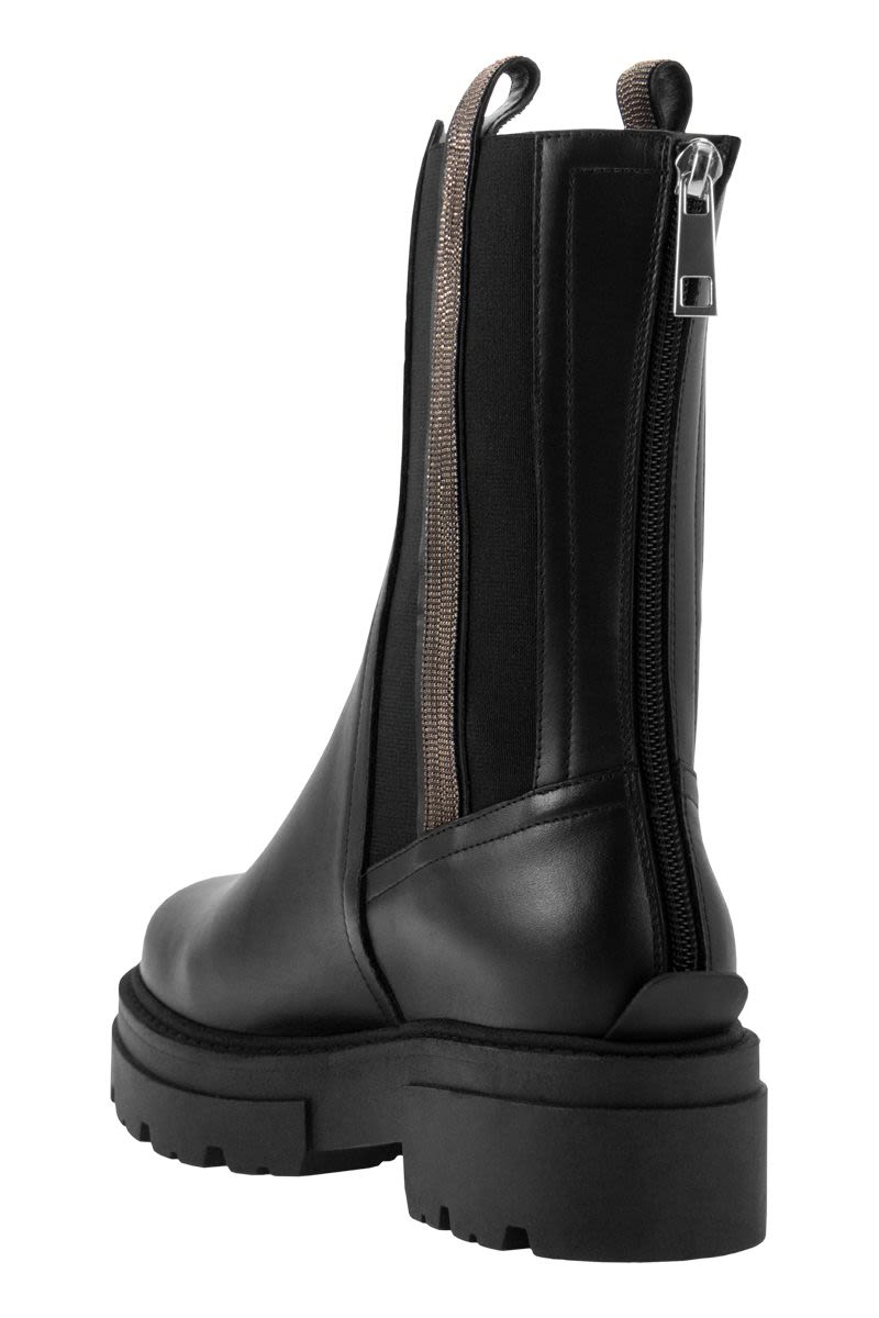 Leather boot with shiny band - VOGUERINI