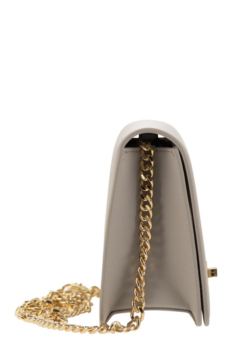 Shoulder bag with gold swivel logo - VOGUERINI