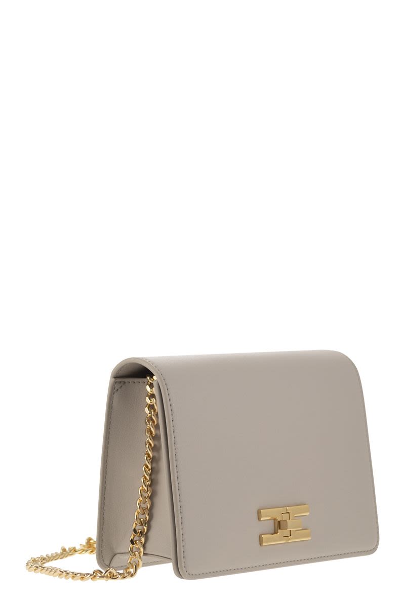 Shoulder bag with gold swivel logo - VOGUERINI