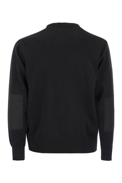 Wool crew neck with iconic badge - VOGUERINI