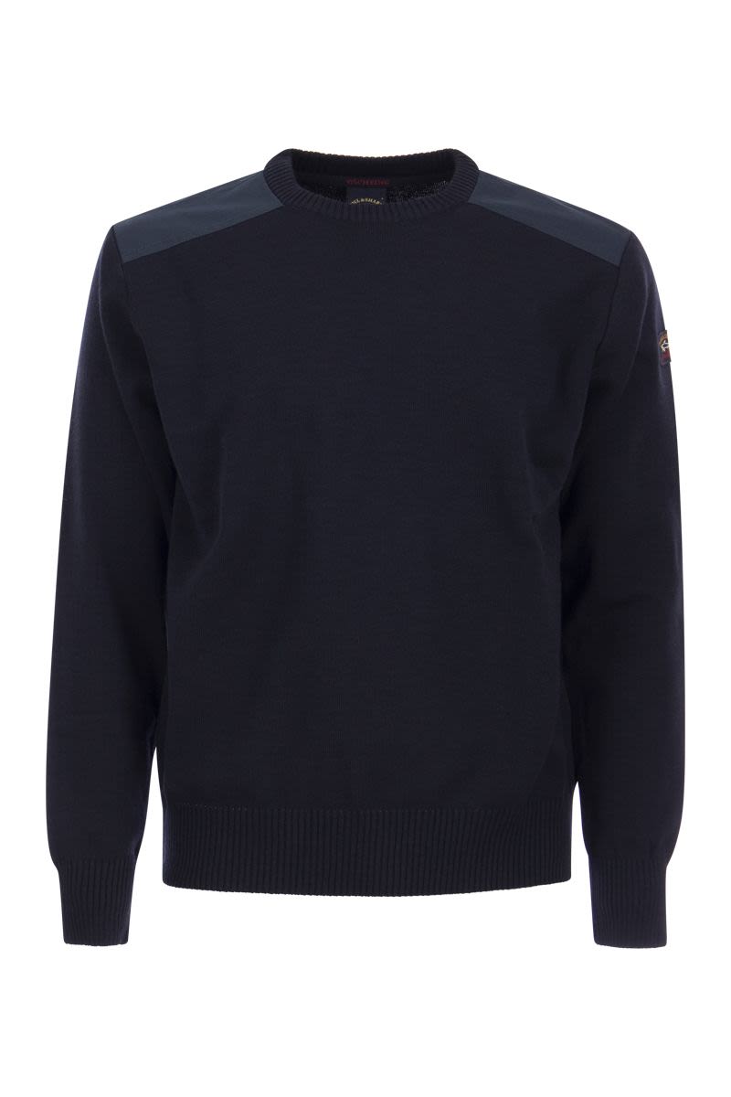 Wool crew neck with iconic badge - VOGUERINI