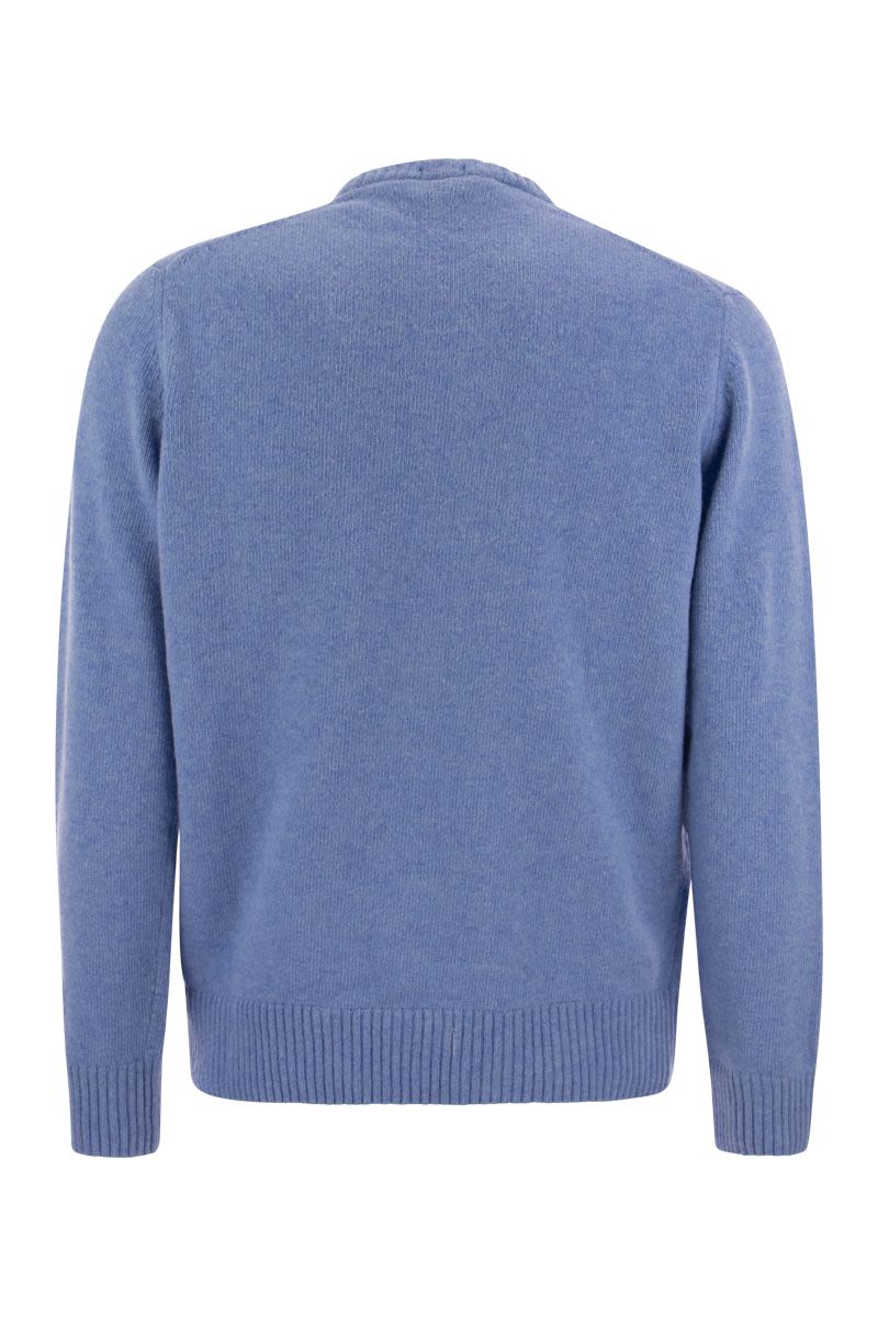 Wool crew neck with arm patch - VOGUERINI