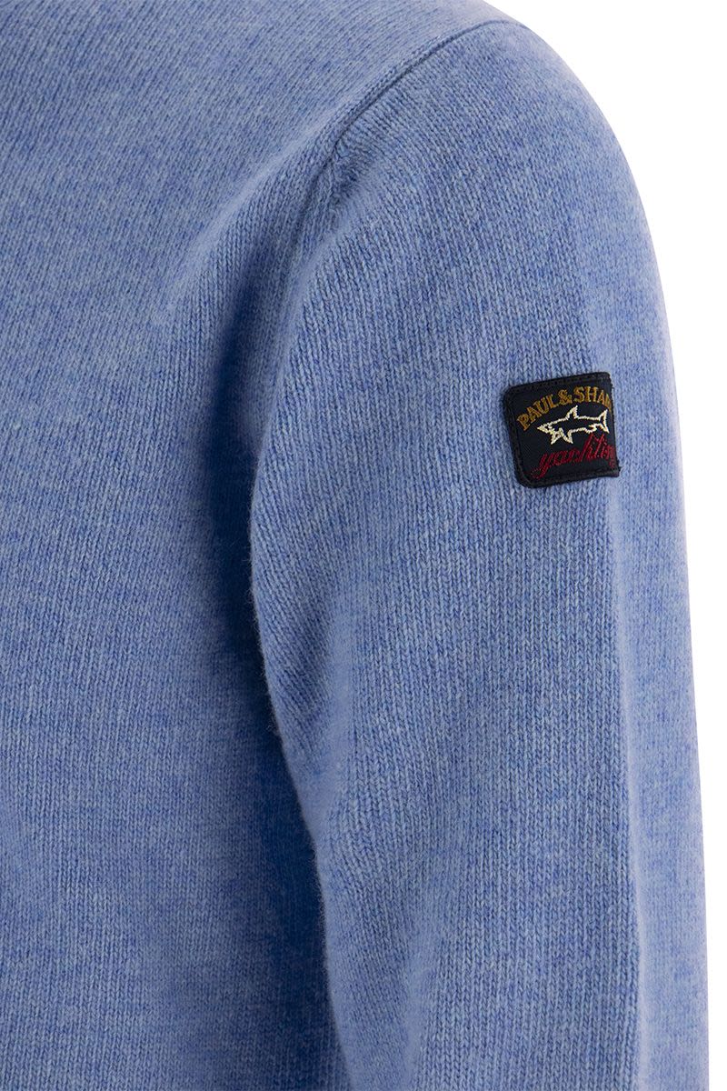 Wool crew neck with arm patch - VOGUERINI