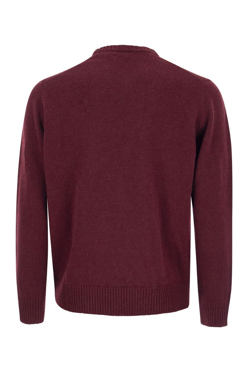 Wool crew neck with arm patch - VOGUERINI