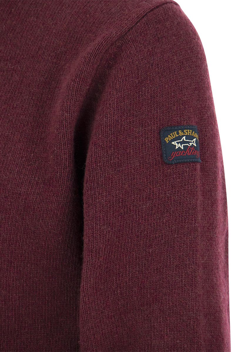 Wool crew neck with arm patch - VOGUERINI