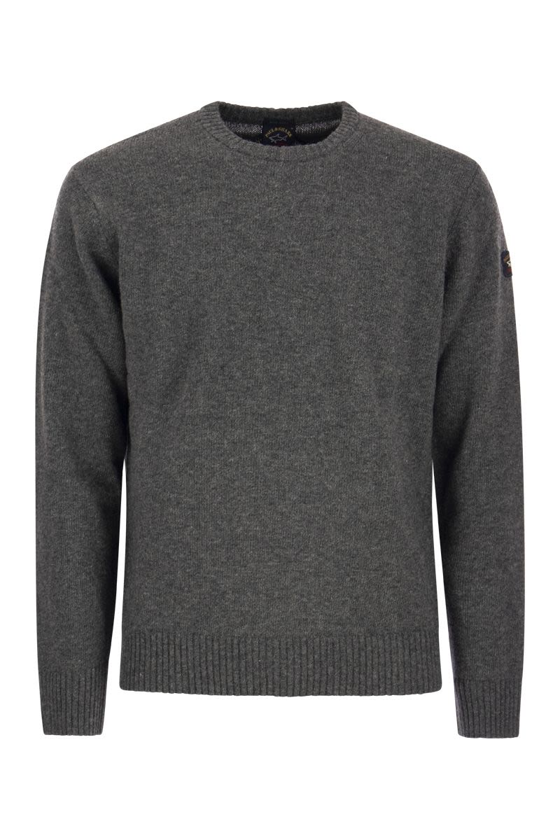 Wool crew neck with arm patch - VOGUERINI