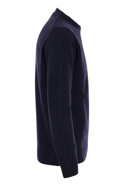 Wool crew neck with arm patch - VOGUERINI