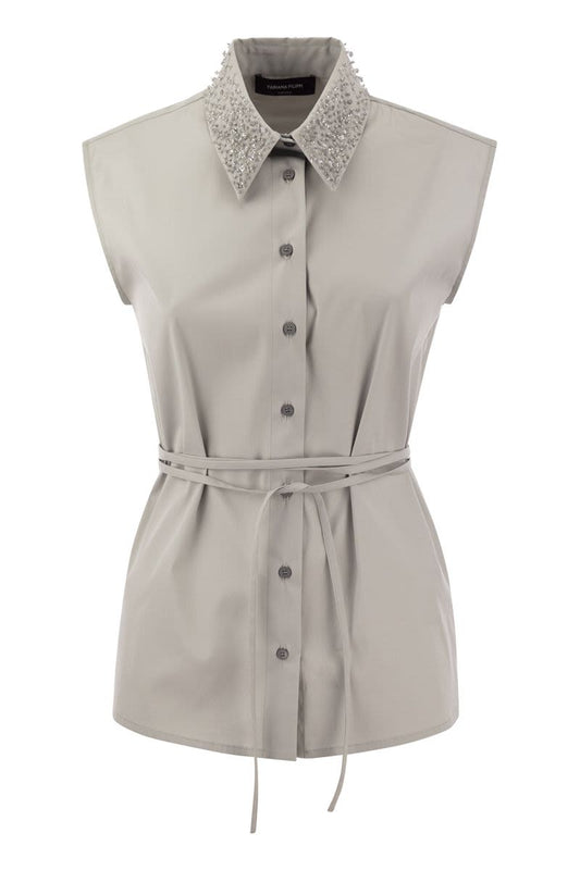 Sleeveless shirt with belt - VOGUERINI