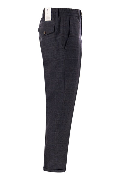 REBEL - Pure virgin wool trousers - VOGUERINI