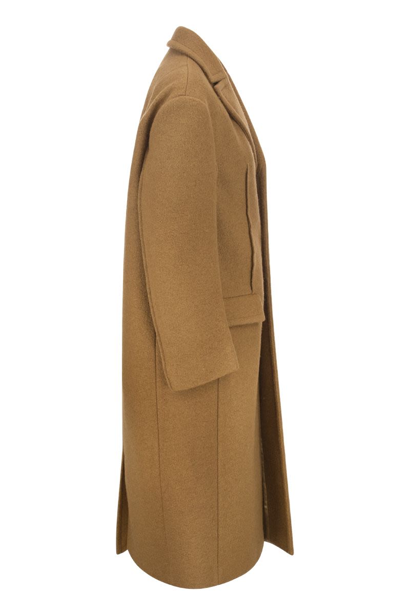 Wool bouclé coat - VOGUERINI