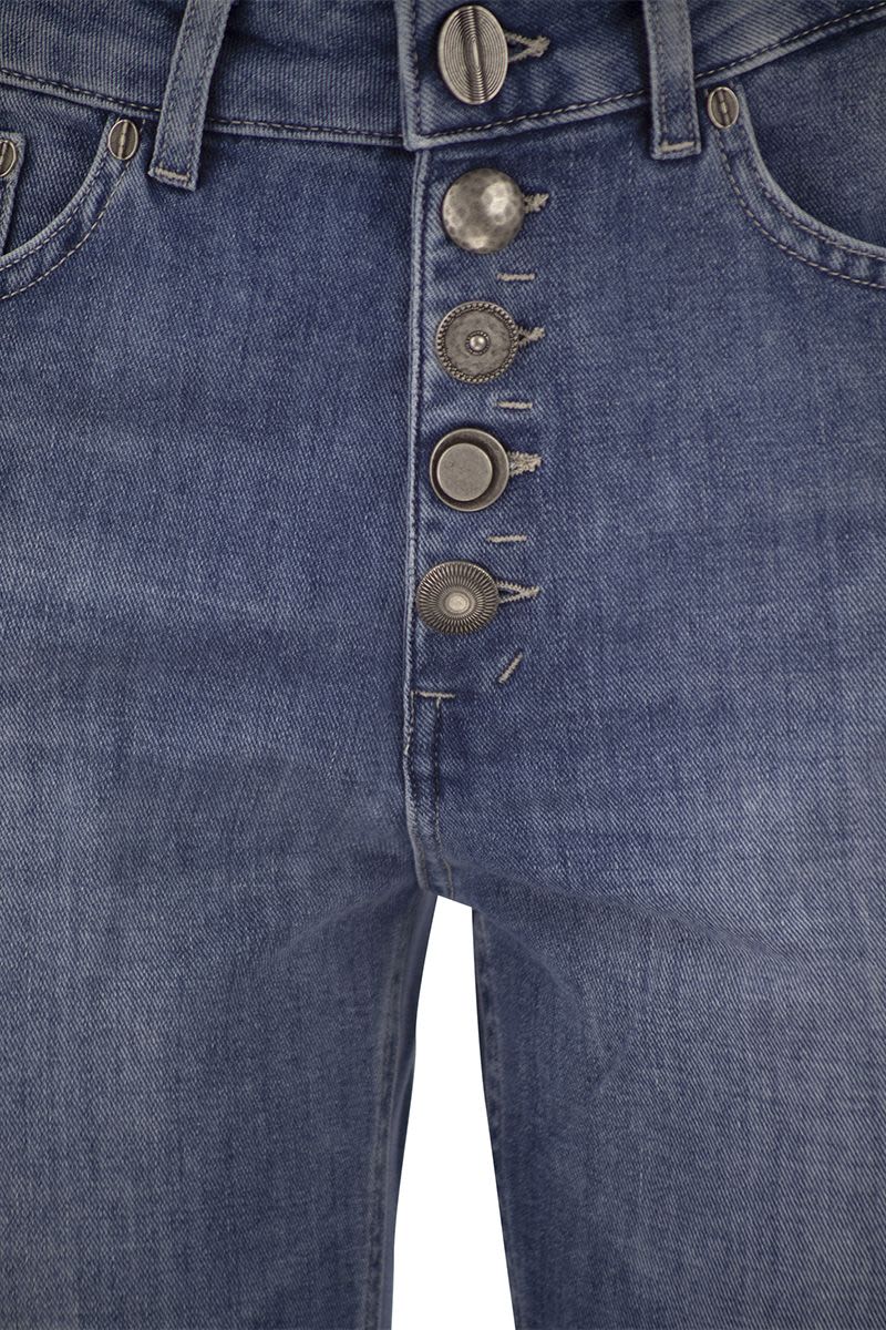 KOONS - Loose jeans with jewelled buttons - VOGUERINI