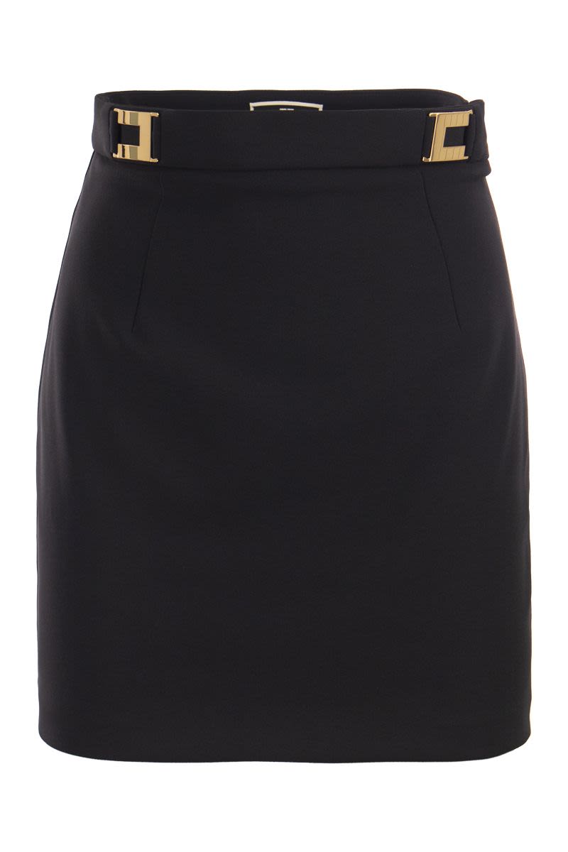 Crepe miniskirt with logo plaques - VOGUERINI