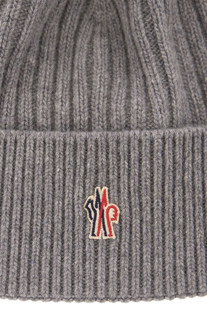 Cashmere and wool cap with pom-pom - VOGUERINI