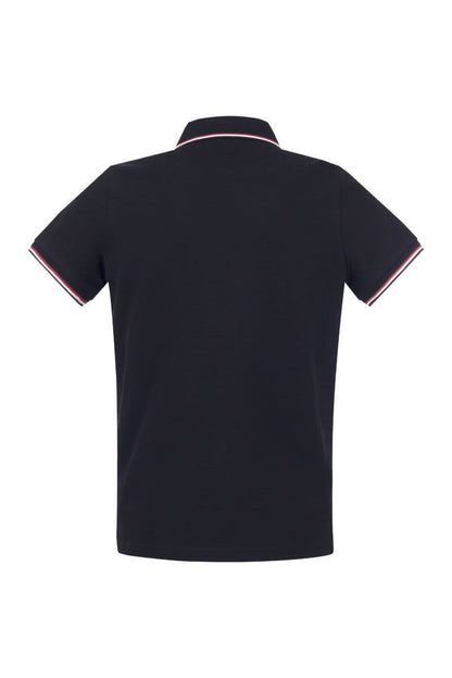 Polo shirt with iconic felt - VOGUERINI