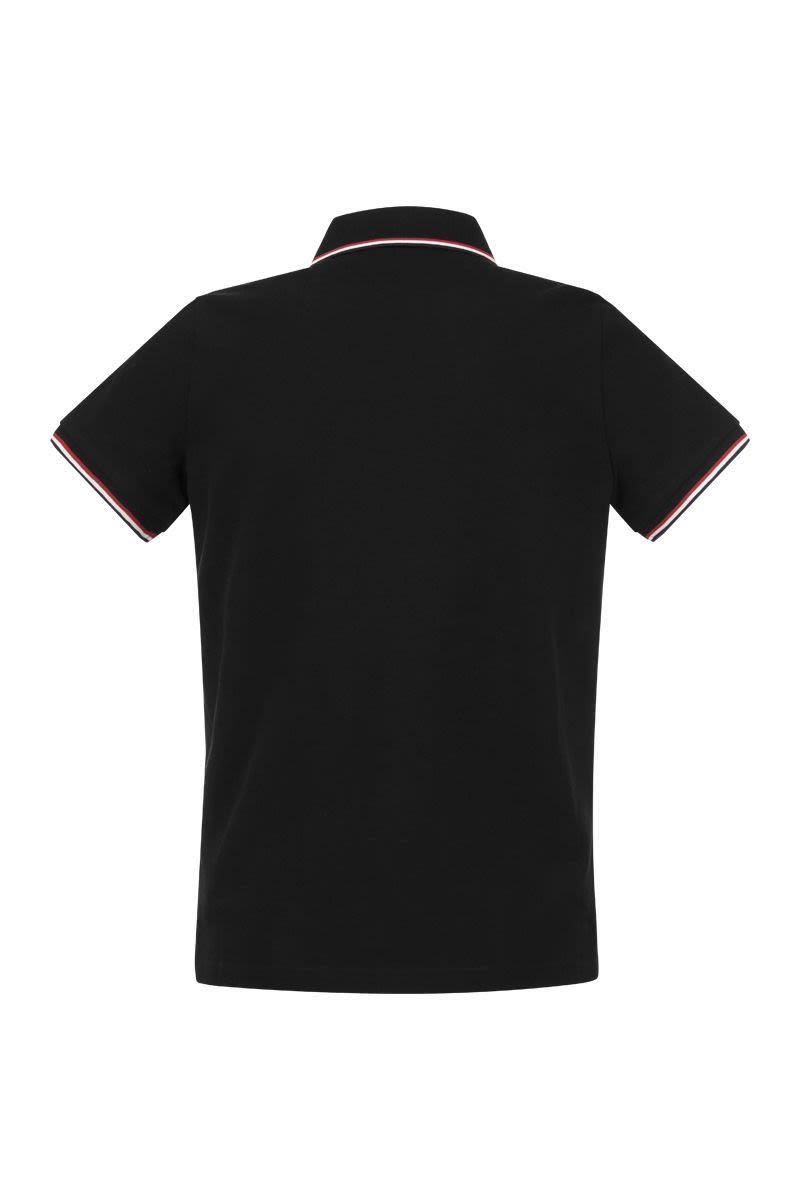 Polo shirt with iconic felt - VOGUERINI