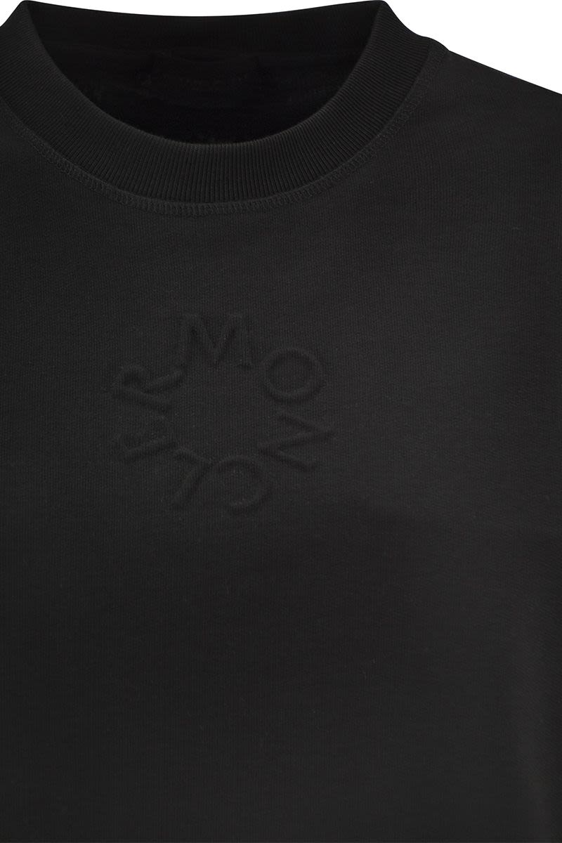 Sweatshirt with embossed logo - VOGUERINI