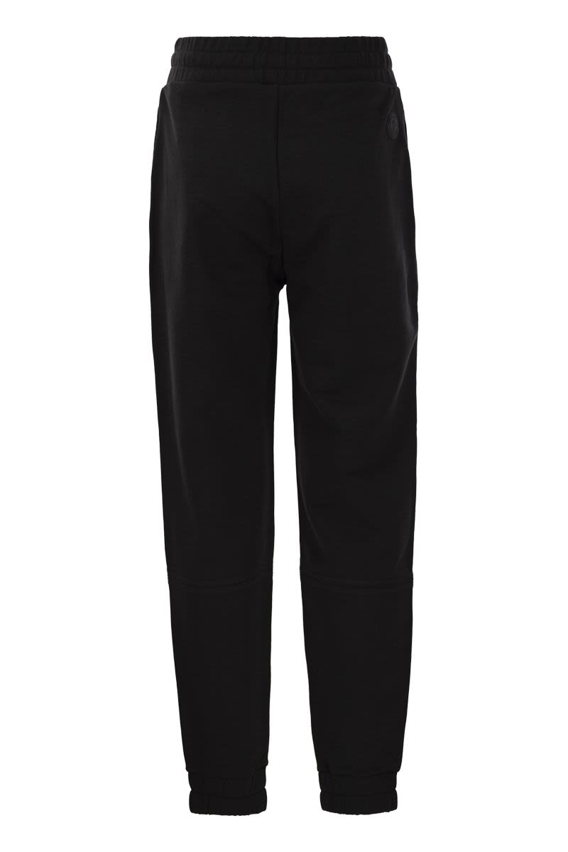 Logo-embossed sports trousers - VOGUERINI