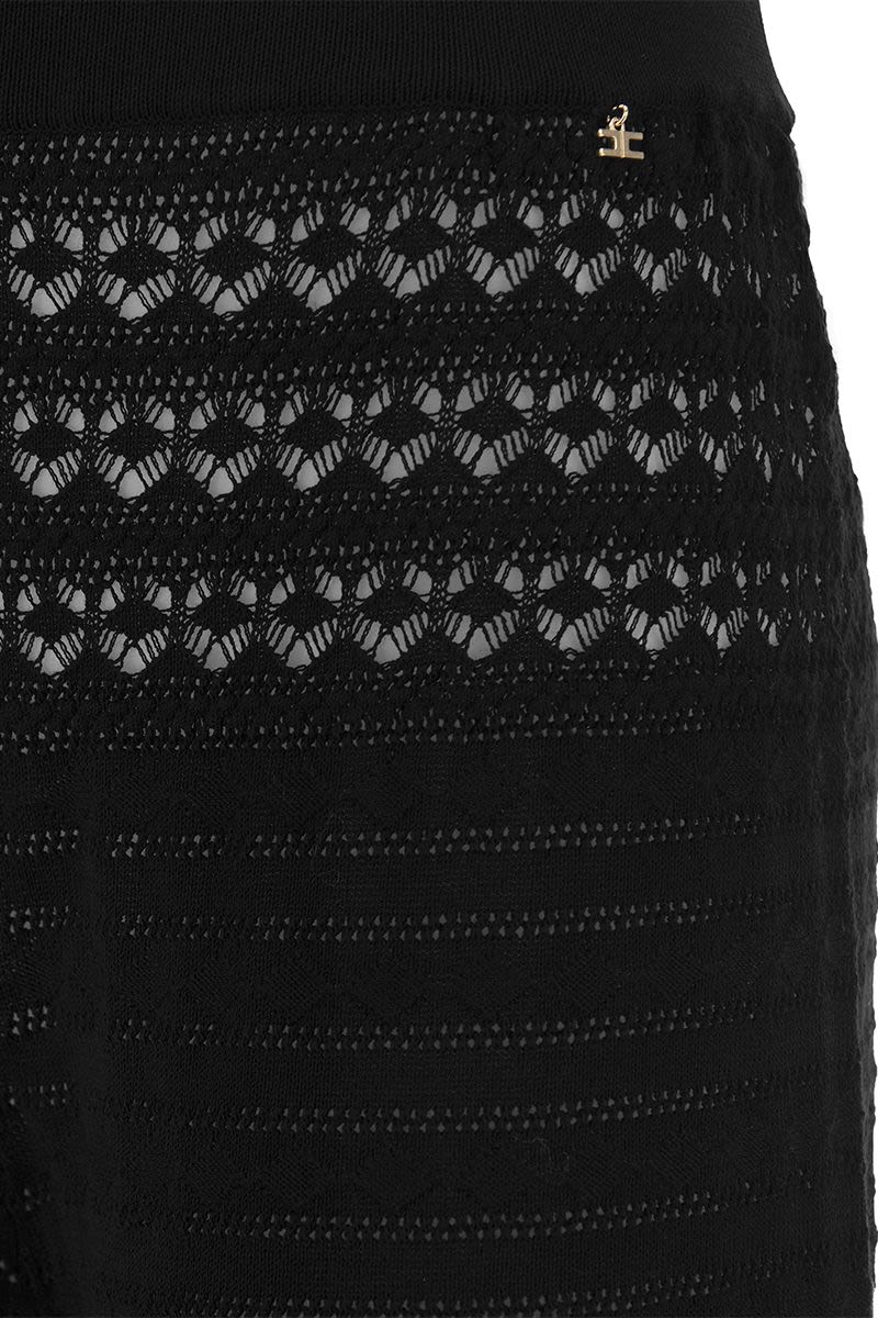 Lace stitch palazzo trousers - VOGUERINI