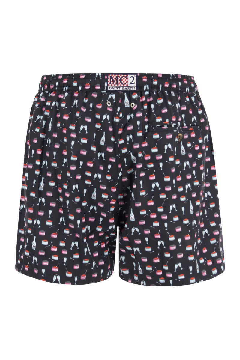 Lightweight fabric swim boxer shorts with print - VOGUERINI