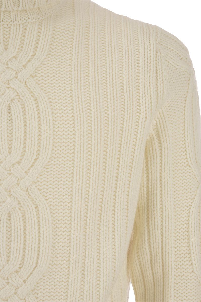 Braided cashmere turtleneck sweater - VOGUERINI