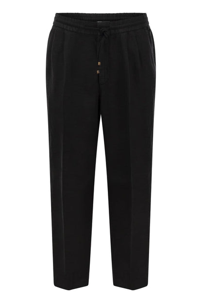 Leisure fit trousers in garment-dyed linen gabardine with drawstring and double darts - VOGUERINI