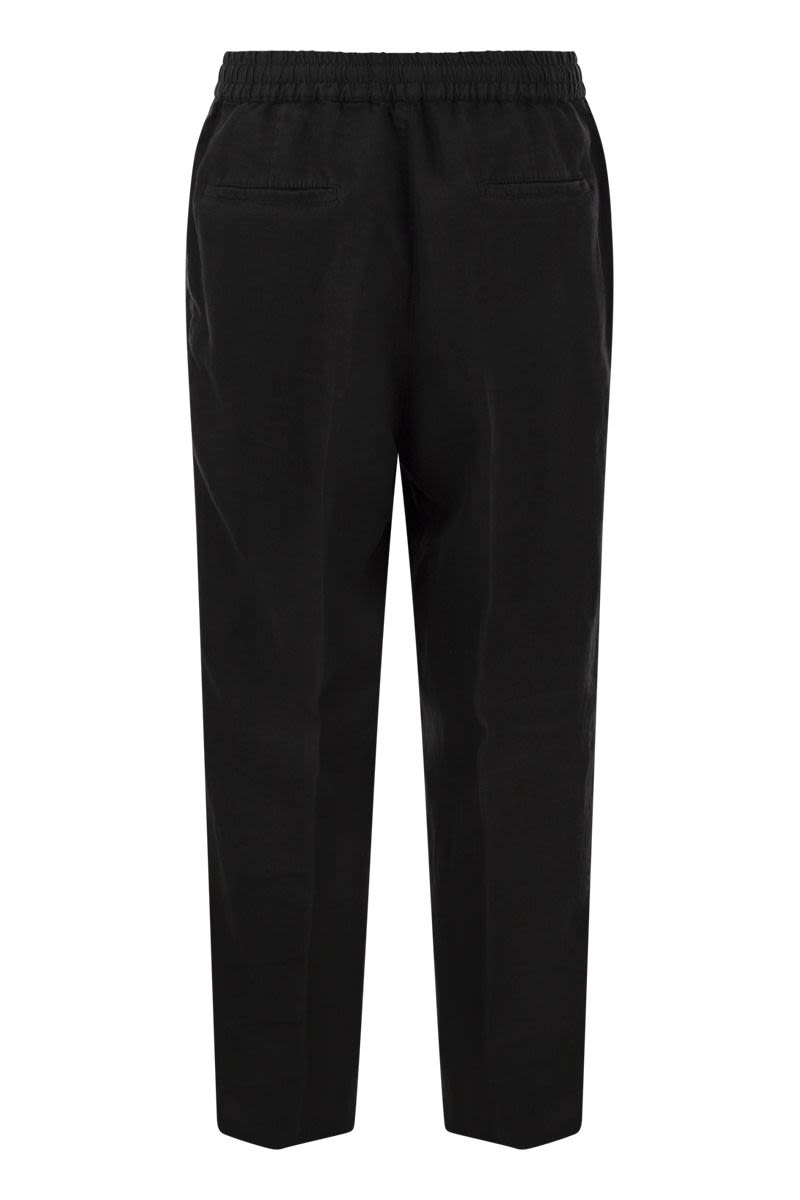 Leisure fit trousers in garment-dyed linen gabardine with drawstring and double darts - VOGUERINI