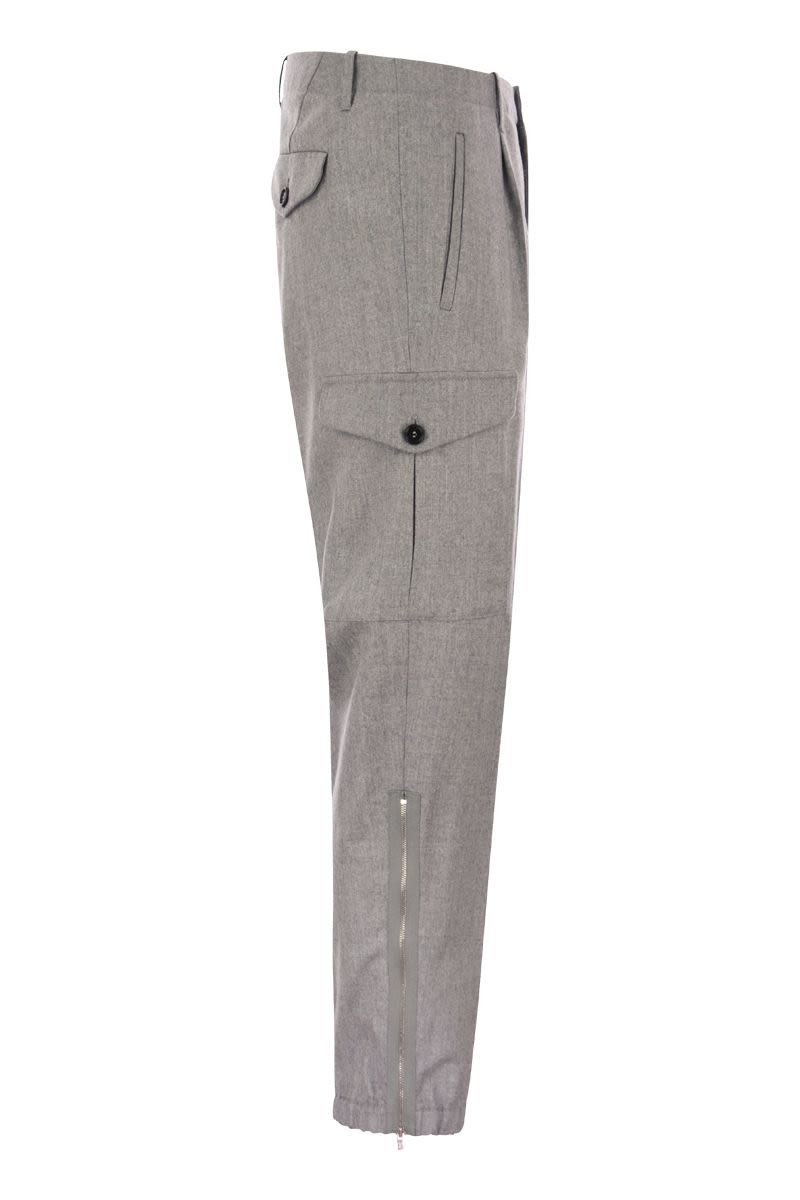 Virgin wool trousers with cargo pockets and bottom zip - VOGUERINI