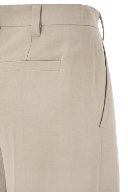 Curved viscose and linen trousers - VOGUERINI