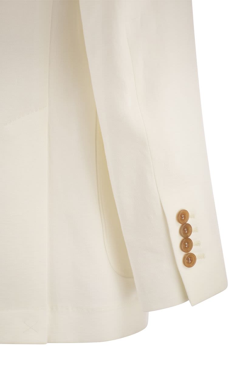 Twisted linen deconstructed jacket with patch pockets - VOGUERINI