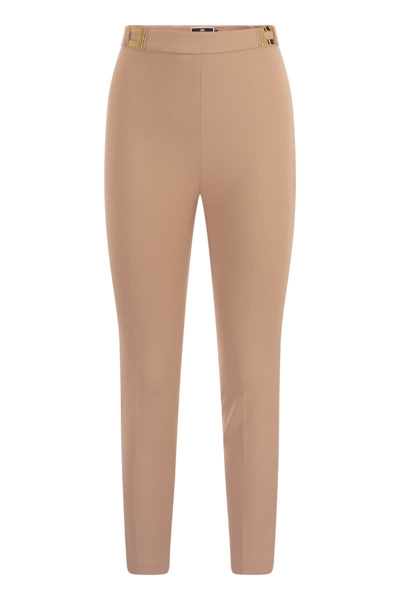 Straight crepe trousers with logo plaques - VOGUERINI