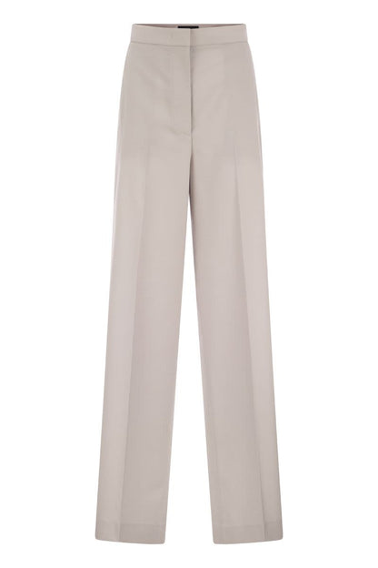 Loose-fitting trousers in wool - VOGUERINI