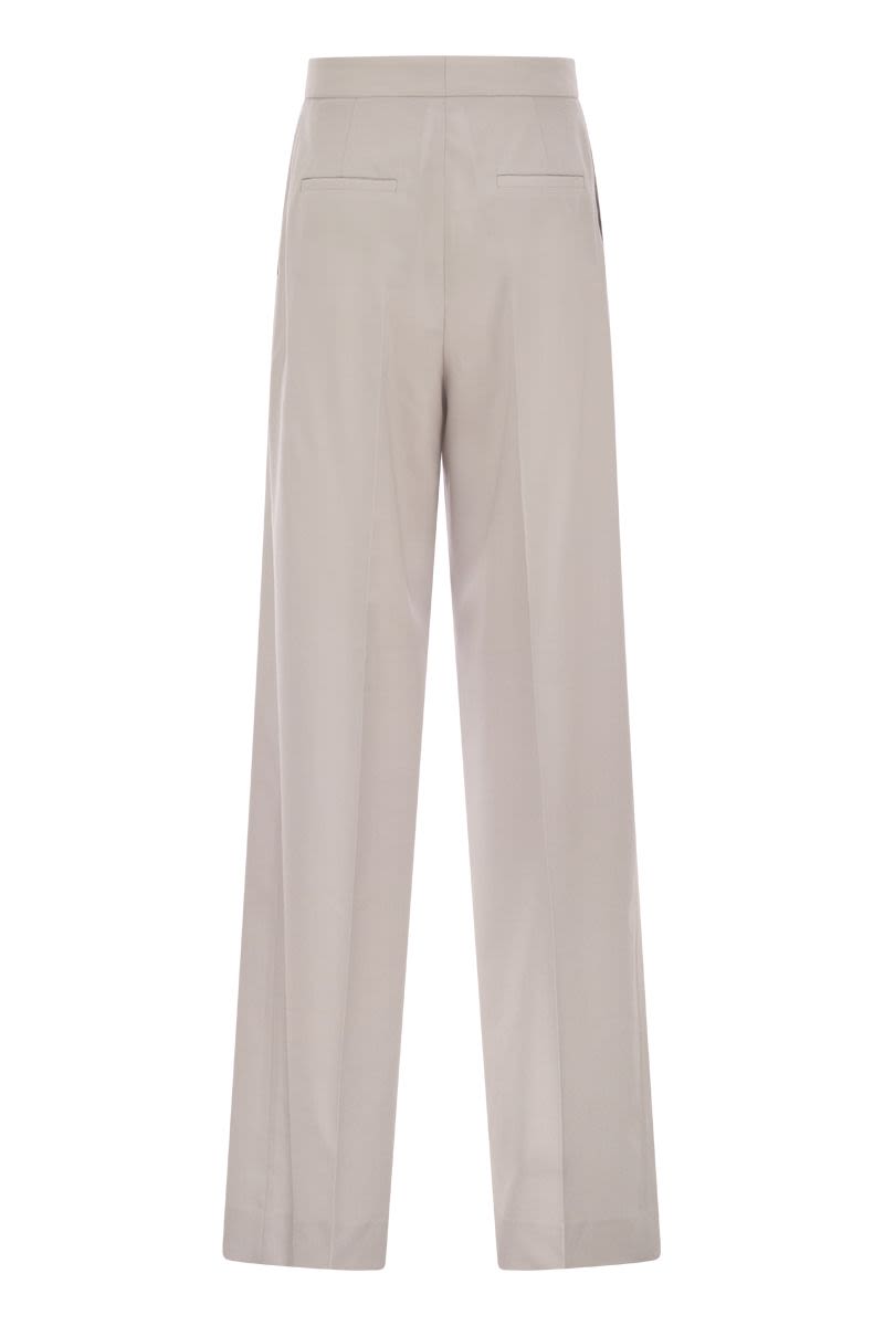 Loose-fitting trousers in wool - VOGUERINI