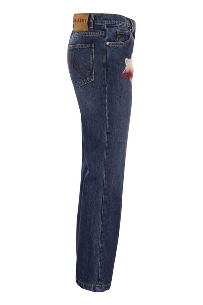 Denim flare trousers with knitted appliqués - VOGUERINI