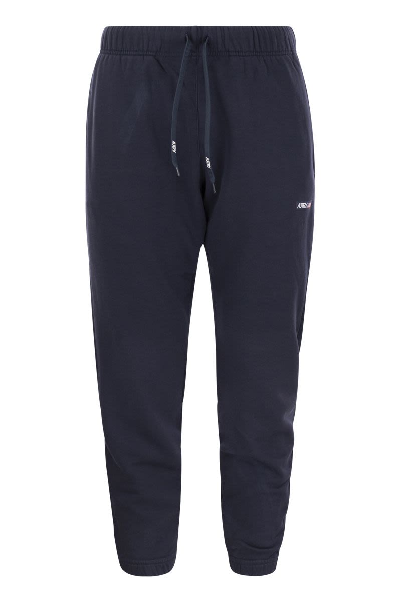 Sweatpants with logo patch - VOGUERINI