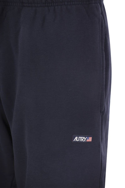 Sweatpants with logo patch - VOGUERINI